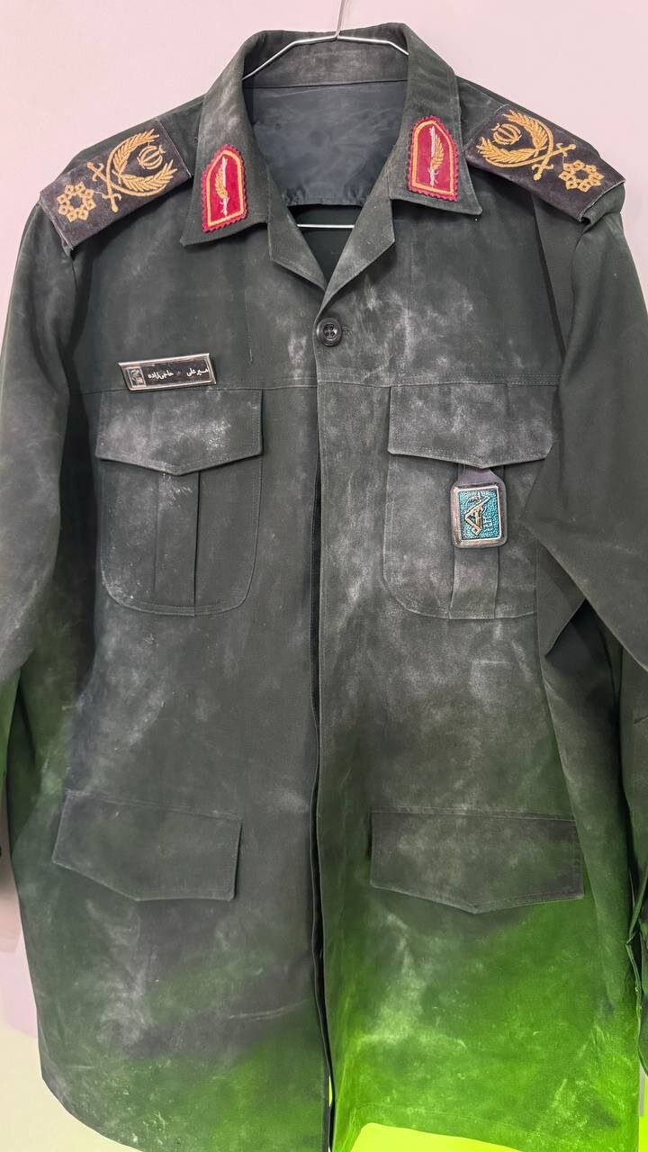 لباس تن شهید حاجی زاده